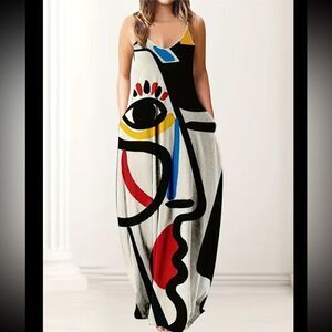 Abstract casual maxi dress with pockets. V neck Sizes in pictures.